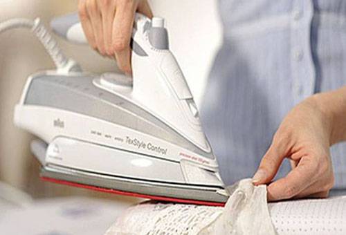 Ironing the starched dress