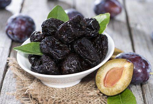 dried prunes on a plate