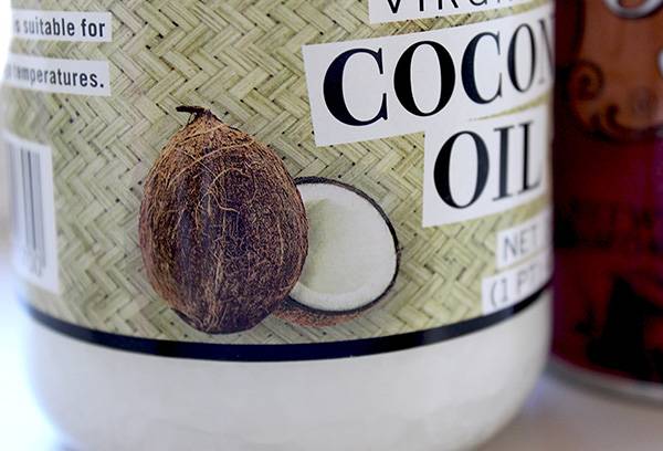Stiklainis kokosų aliejaus