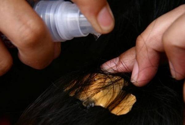 Remoção de goma de silicone para cabelos