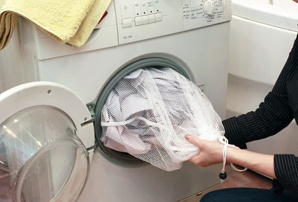 Naudojant skalbinių maišą