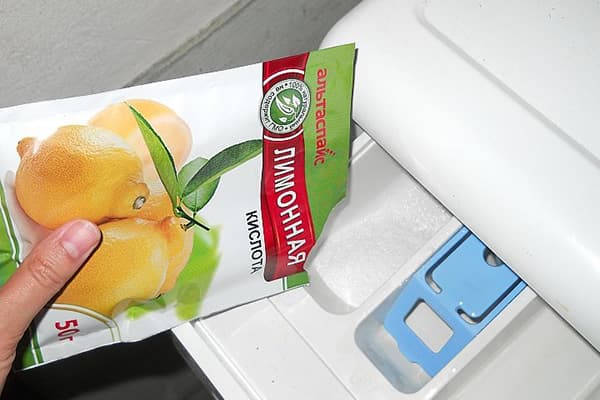 Tilsetning av sitronsyre i vaskemaskinen